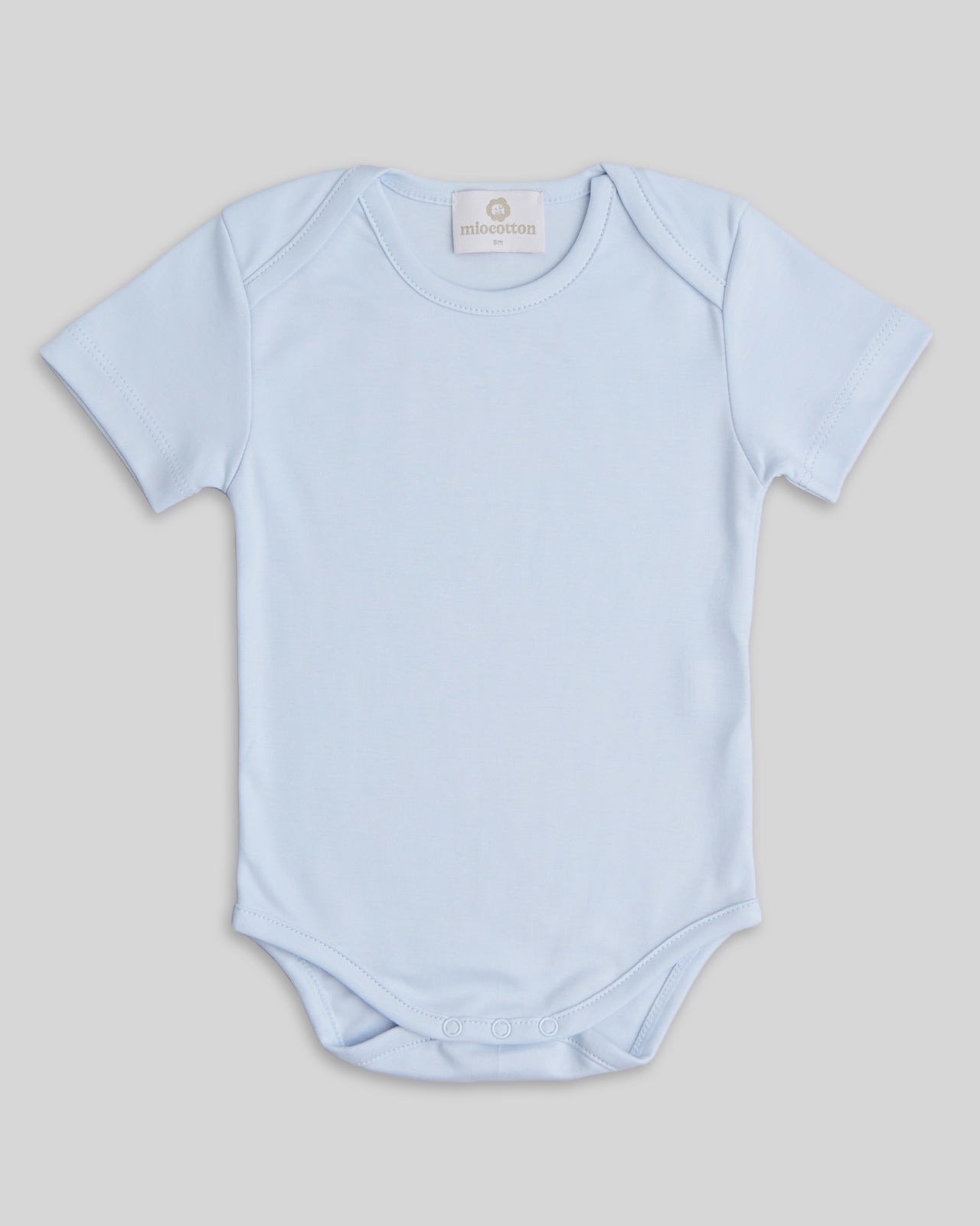 Bodysuit for newborns in light blue, soft and cozy fit
